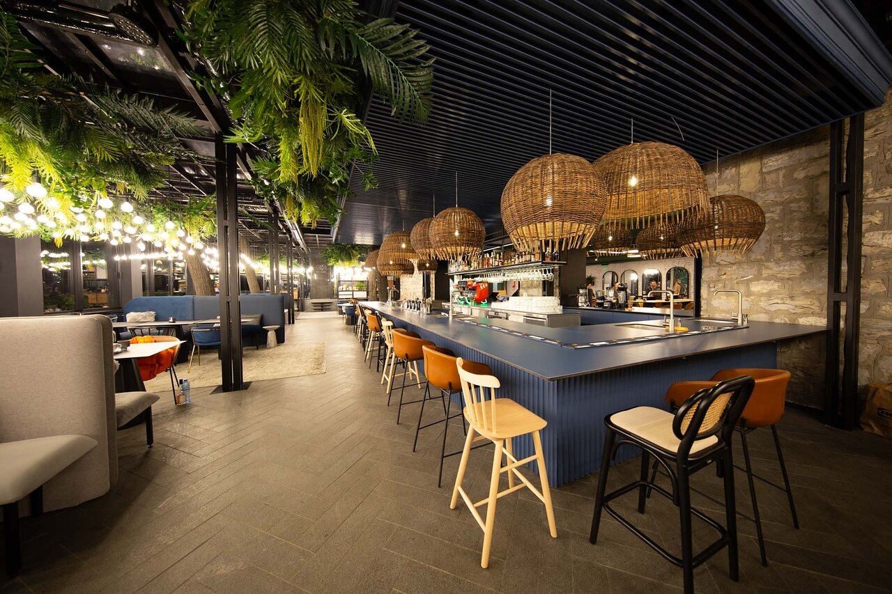 Bar area with decorative pendants at 042 Bar&Dinner